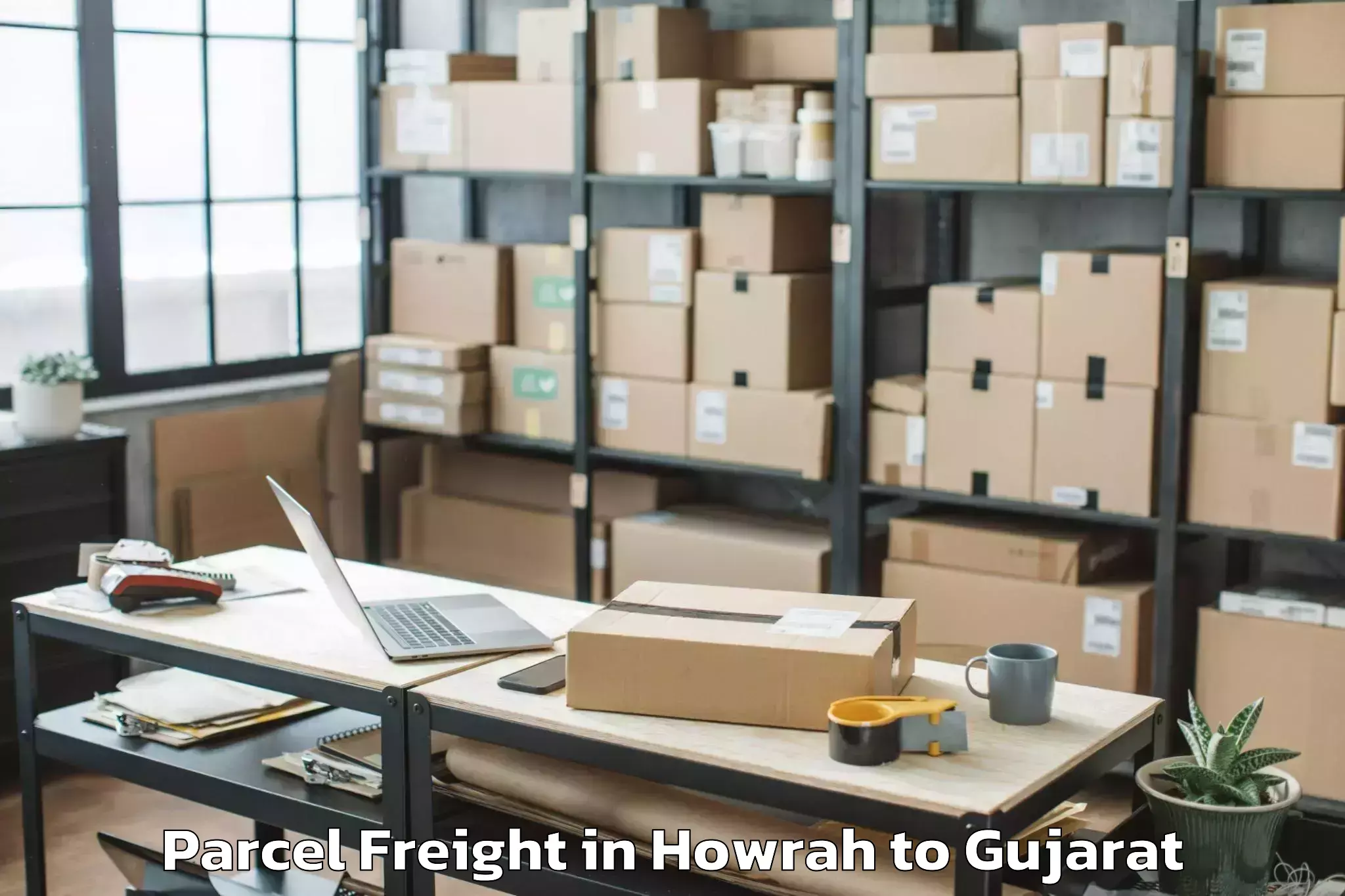 Book Your Howrah to Balasinor Parcel Freight Today